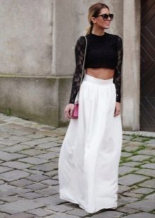A long white half-skirt with a black top