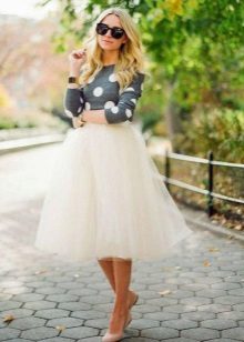 A multi-layered skirt combined with ballet flats