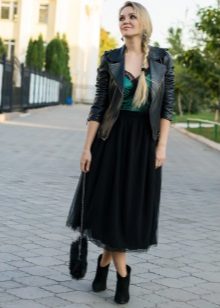 A long layered black skirt combined with a jacket