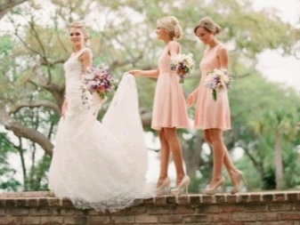 Delicate peach dresses for bridesmaids