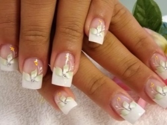 French manicure with golden elements under a mustard dress