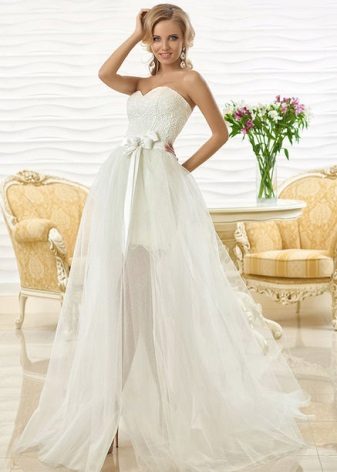 Short wedding dress with a detachable train