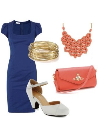 Orange accessories for a navy blue dress
