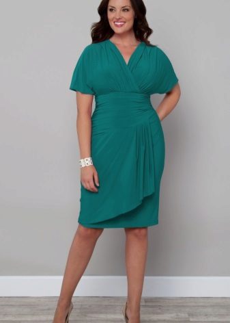 Mid-length dress with drapery covering the belly