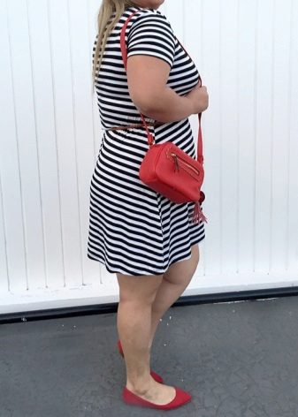 Striped white and blue knitted dress for full ones in combination with red accessories