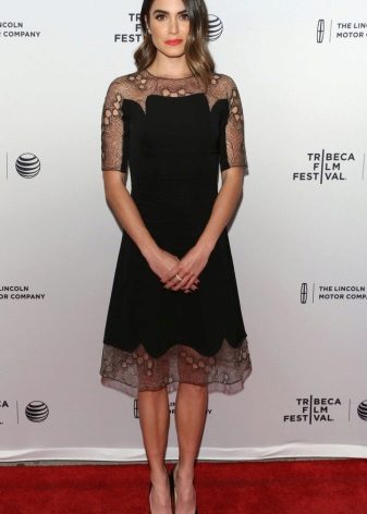 Shoes under an evening dress with lace