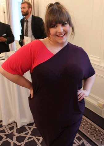 Office dress of a straight cut combined from two fabrics for full