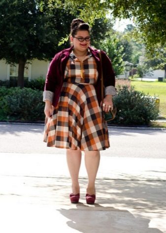 Check dress for overweight women in combination with a cardigan
