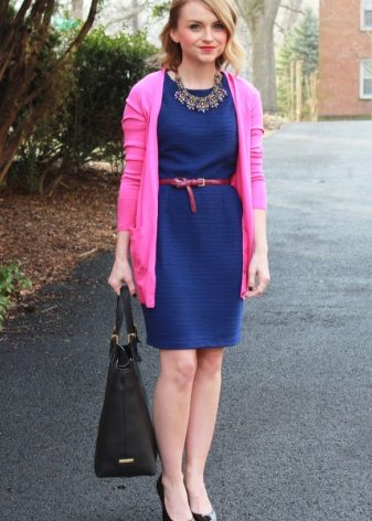 Blue dress with a contrasting strap on a corporate party