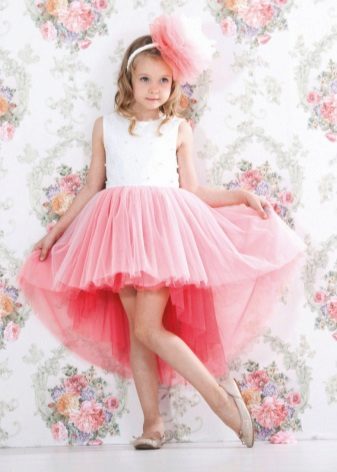 Short front long back dress for a girl from tulle
