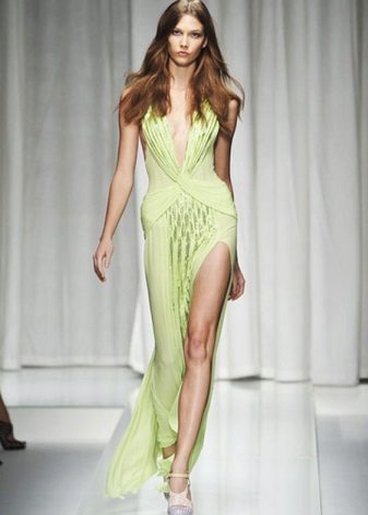 Long light green dress with a slit