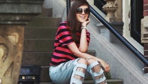 Jeans ripped on his knees