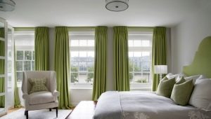Features of using green curtains in the bedroom interior