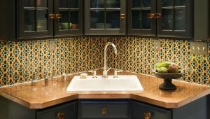 Kitchens with a sink in the corner: the pros and cons, examples in the interior