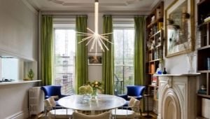 Green curtains in the interior of the living room