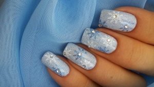 Winter manicure with snowflakes on nails