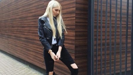 Black jeans with holes in the lap