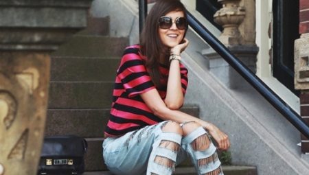 Jeans ripped on his knees