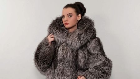 A silver fox fur coat with a hood