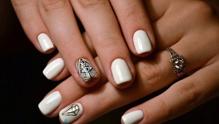 Design of white manicure for short nails.