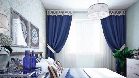 The use of blue and blue curtains in the interior of the bedroom