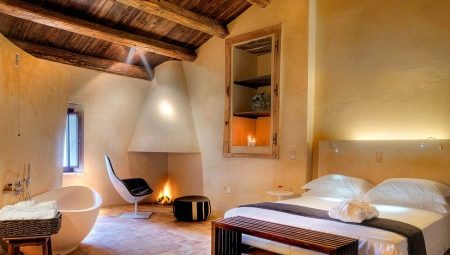 Fireplace in the bedroom: purpose, types and choice