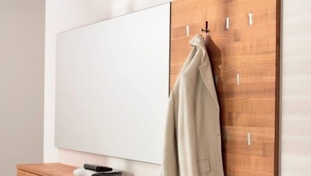 Wall hooks for clothes in the hallway: what are and how to choose?