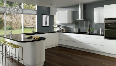 Overview of kitchens with black countertops