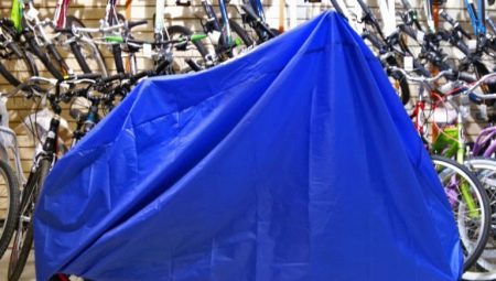 Bicycle covers: varieties, pros and cons, selection recommendations