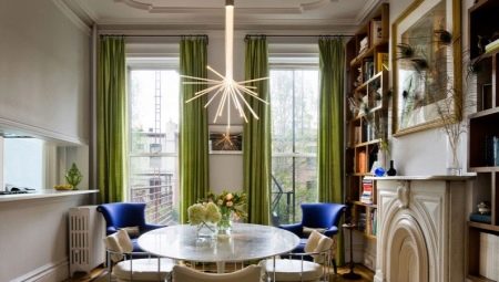 Green curtains in the interior of the living room