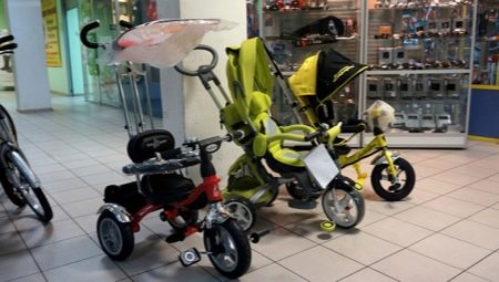 Children's tricycles with a handle
