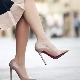 Beige patent leather high heel shoes