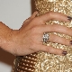 On which finger are the engagement ring worn?