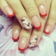 Red jacket on nails: a choice of shade and a combination of colors