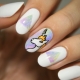 Unicorn manicure design with unicorn.
