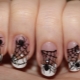 Stylish design options for manicure with a spider.