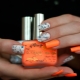 Bright and unusual ideas for combining white with orange shades in a manicure