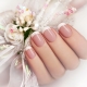 French manicure in soft colors.
