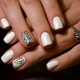 Design of white manicure for short nails.
