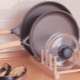 Stands for lids from pans: types and nuances of choice