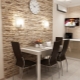 Options for decorating the wall near the table in the kitchen