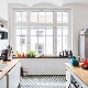 Design of a kitchen with a window: useful tips and interesting examples