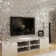 Design a wall with a TV in the living room