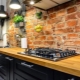 Brick apron for a kitchen: design, materials and selection tips