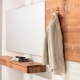 Wall hooks for clothes in the hallway: what are and how to choose?