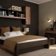 Bedroom with dark furniture: features and design options