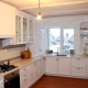 Corner kitchens with a window: how to correctly design and beautifully design?