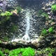 Waterfall in an aquarium: device and manufacture