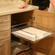 Retractable baskets for the kitchen: features, types and choices