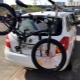 The trunk for the bike on the rear door of the car: features and selection